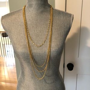 Long gold necklace